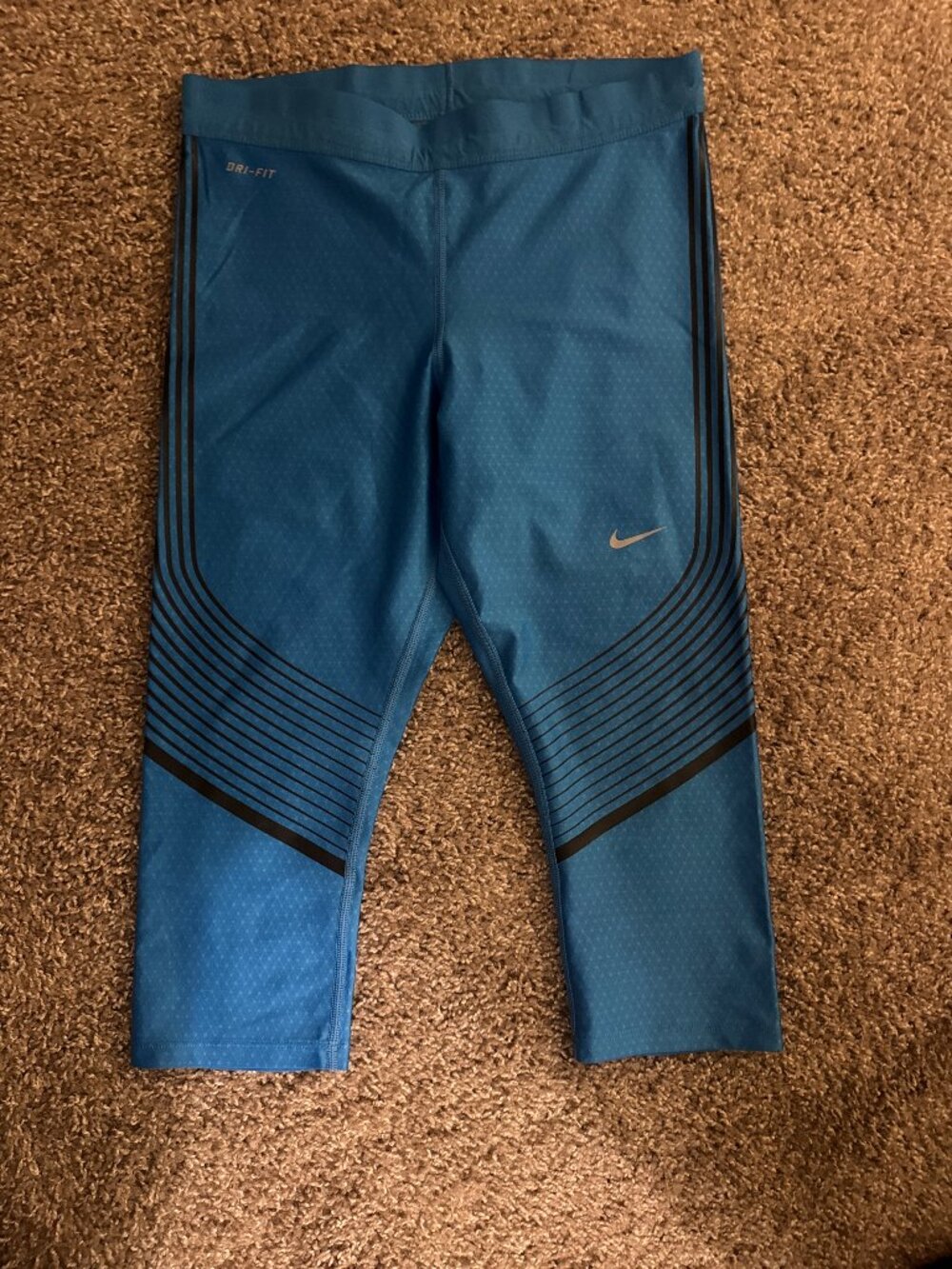 Nike Blue Athletic Cropped Dri-FIT Leggings with Black Stripe Detail
